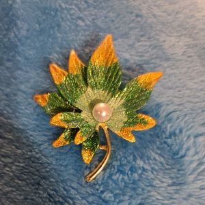 G & S brooch gold  and green leaf